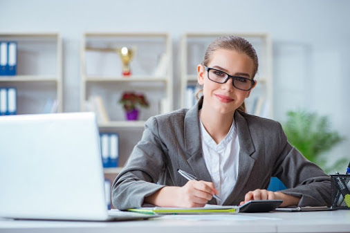 charterd accountant via women working at desk